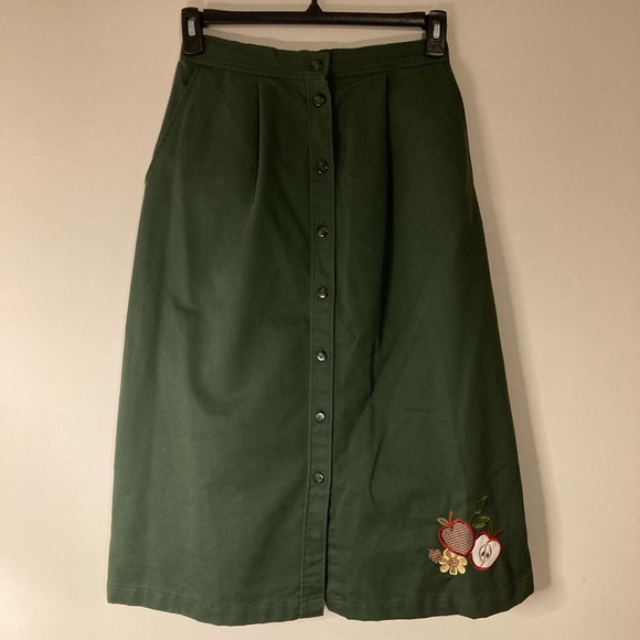 Bon Worth Dresses & Skirts - Olive green A Line button down maxi skirt pocket embroidered floral apple detail